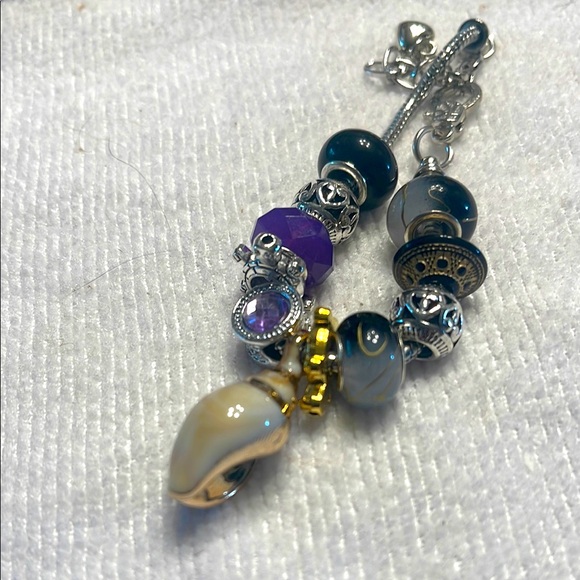 Jewelry - Elegant Silver and Gold Charm Bracelet